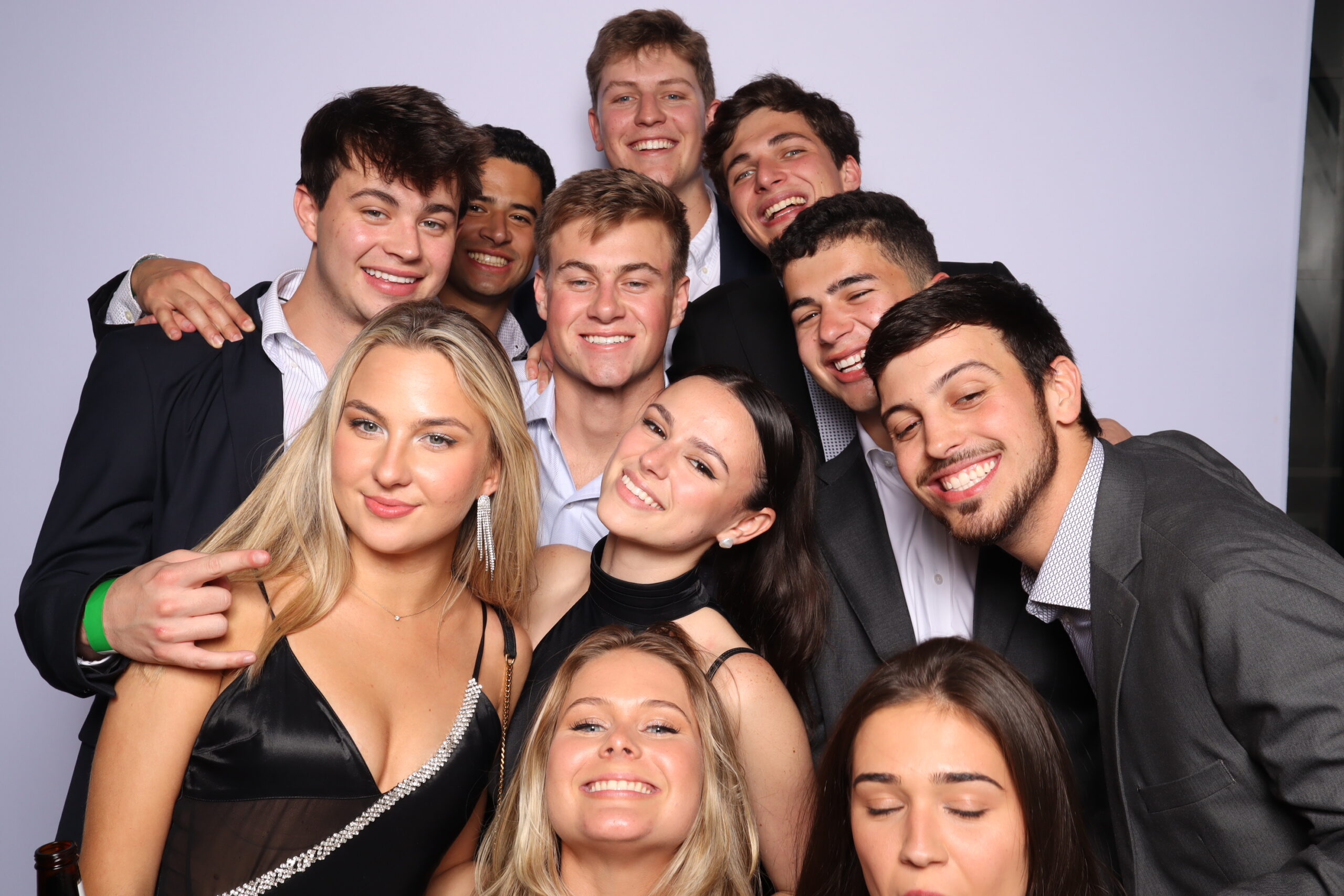Guests celebrating with a stylish photobooth for rent at an Orlando birthday party