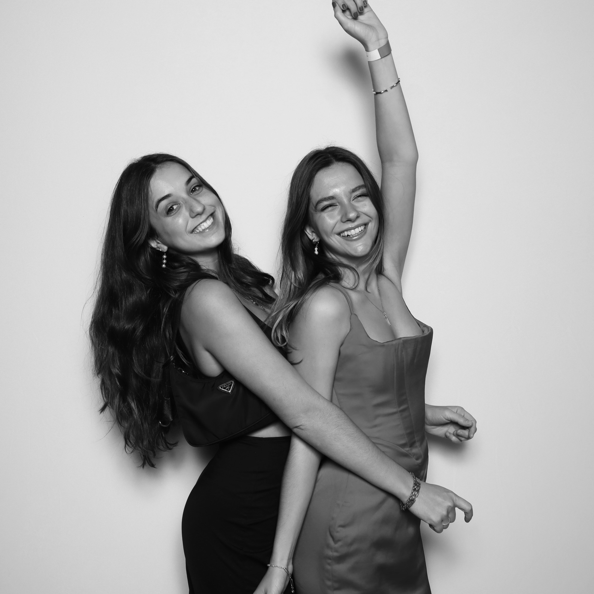 Photo Booth for Bars: Friends posing together in a stylish bar photo booth setup