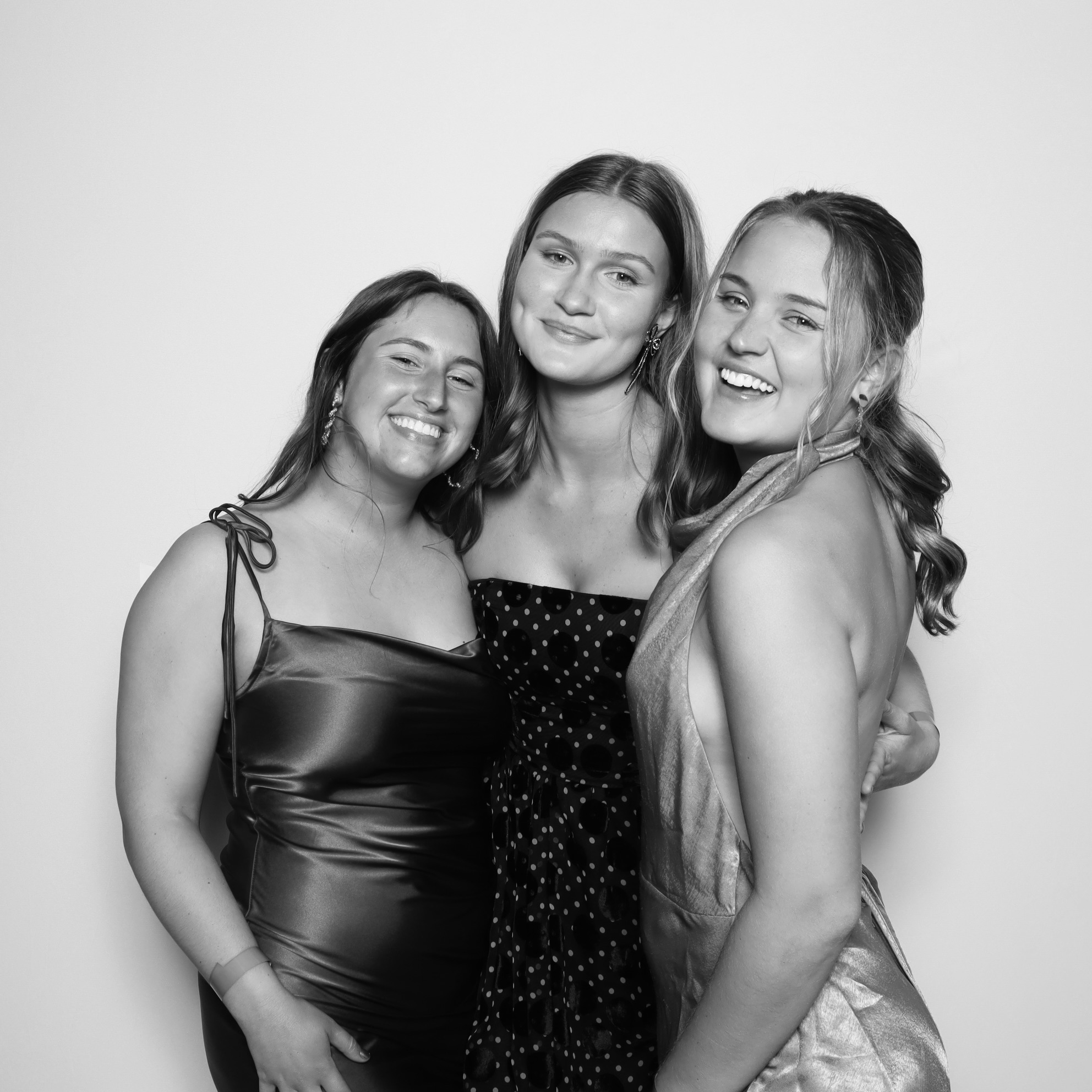 Guests posing with animated filters at a digital photobooth rental in Orlando