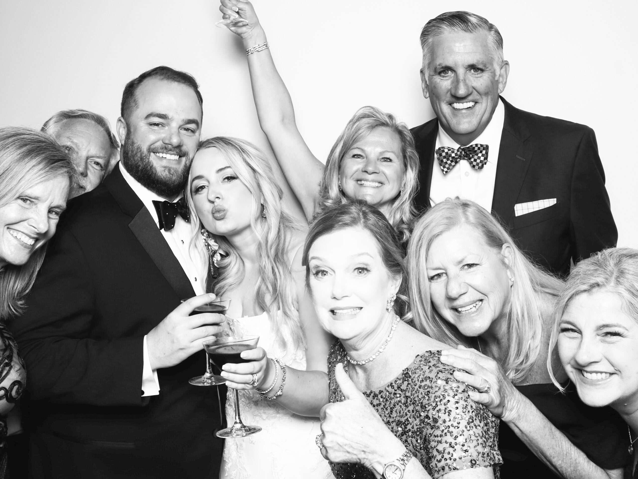 360 Photo Booth for Rent Orlando.Guests enjoying a 360 photo booth at an outdoor Orlando wedding