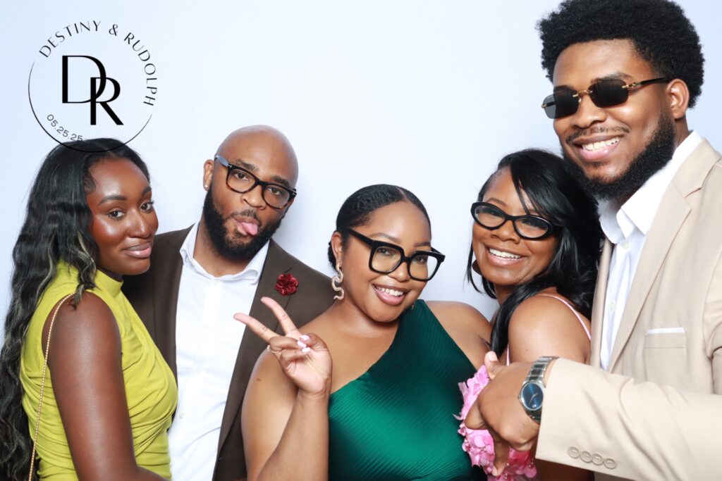 Strata Booth team assisting guests at a corporate photo booth rental