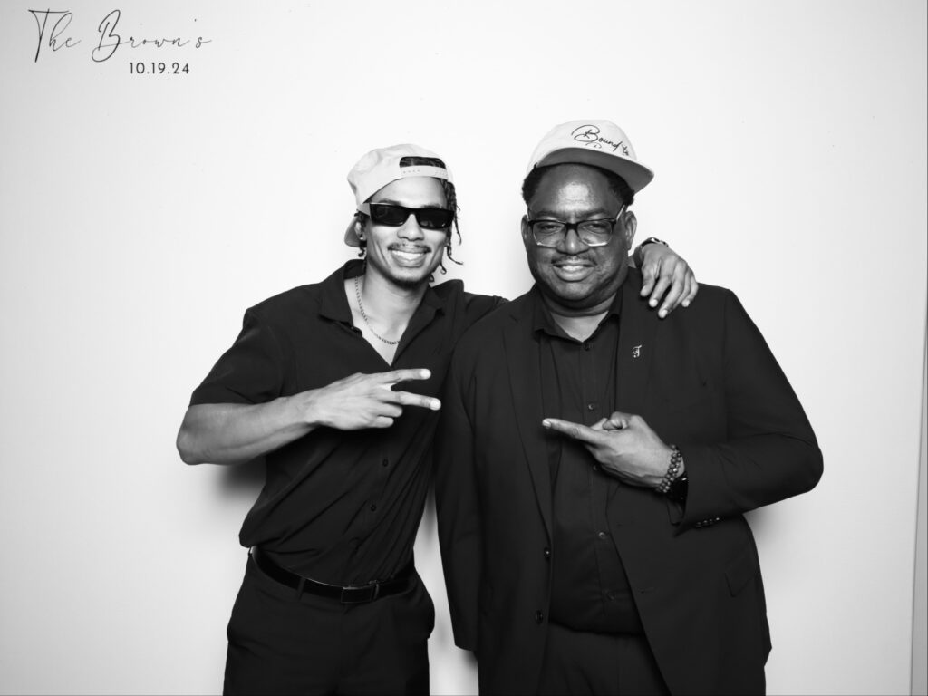 Corporate team enjoying a mosaic photo booth activation in Orlando