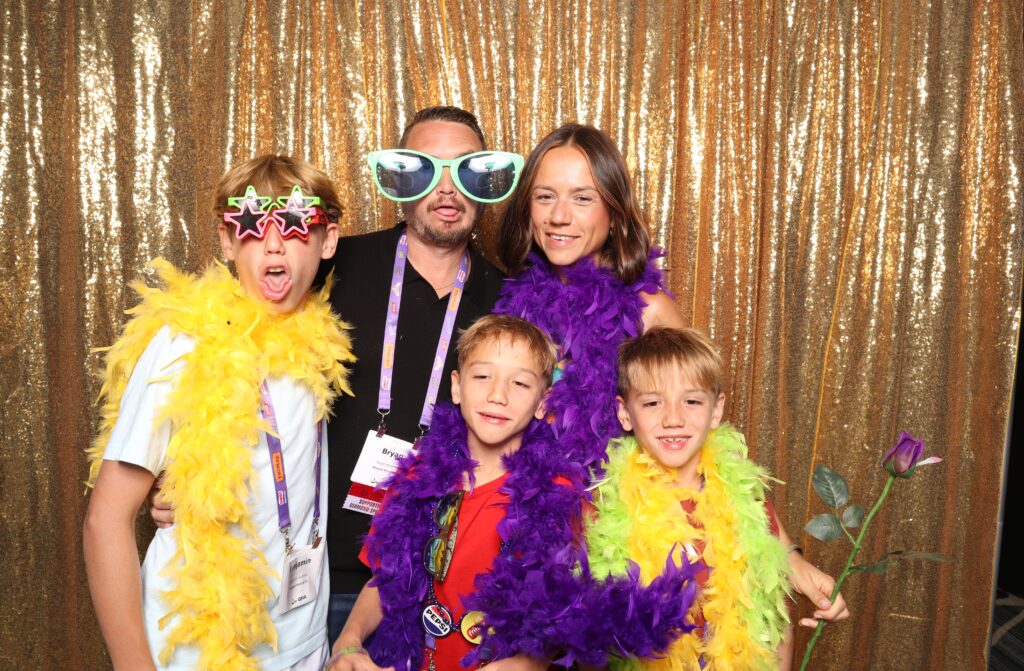 Modern photo booth setup with custom backdrop and lighting