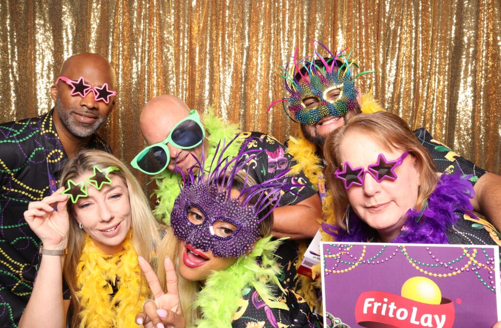  High-quality photo booth prints being displayed at a corporate Orlando event