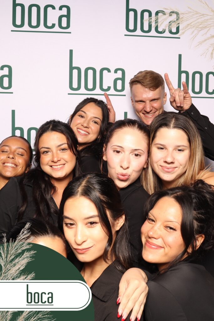 Guests enjoying a 360 photo booth during a DMC-led event