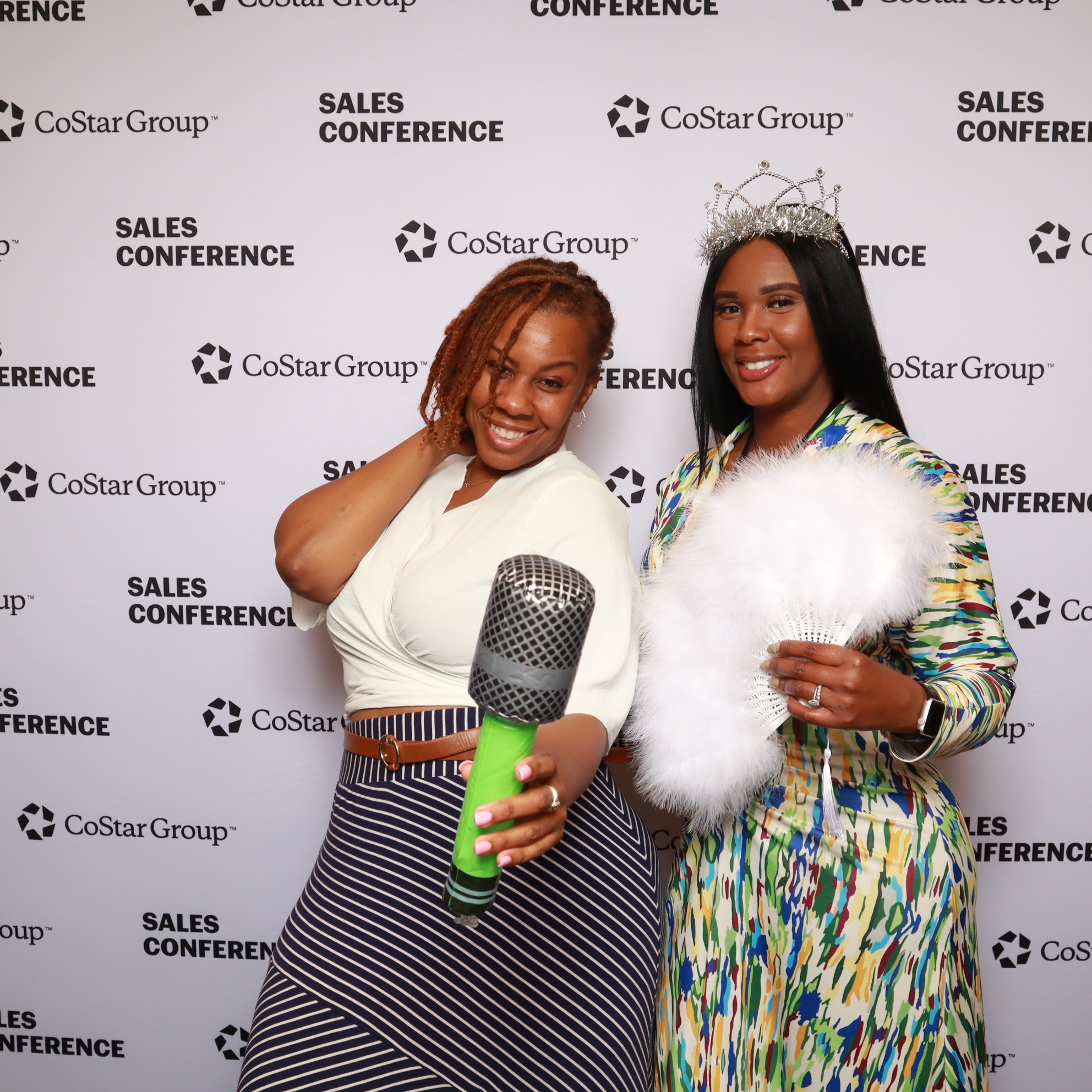 Guest using branded photobooth rental with live sharing at Orlando event