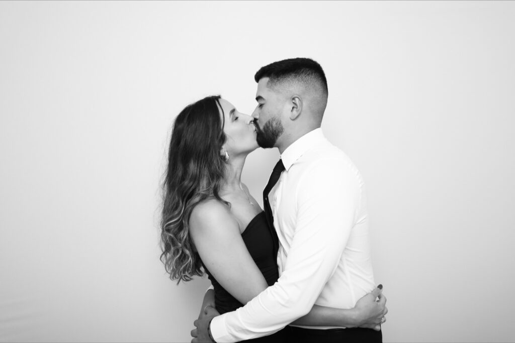 Glam photo booth backdrop at Bella Cosa Lakeside wedding
