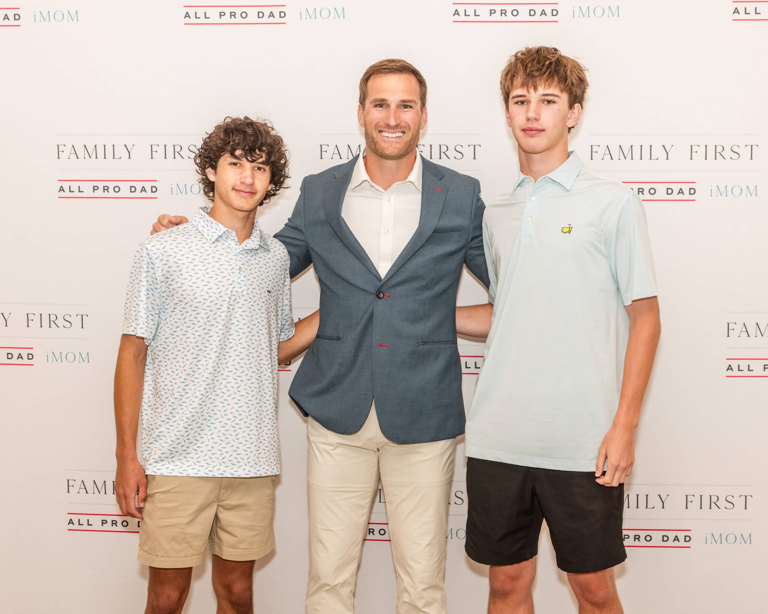 NFL quarterback Kirk Cousins meets a guest at the All Pro Dad event in Orlando