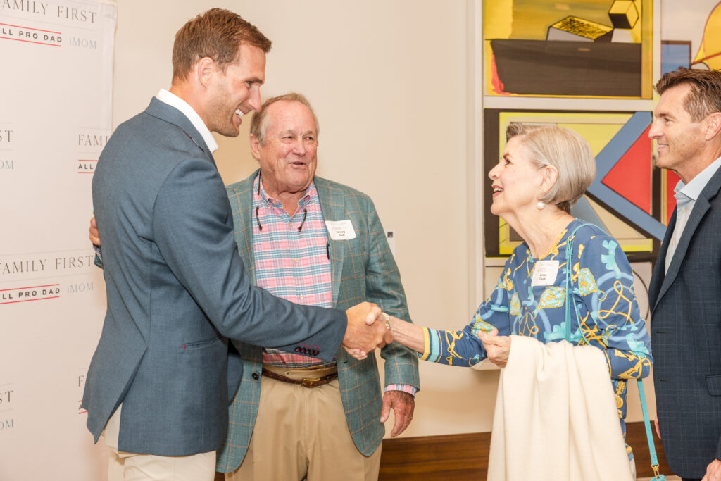Guests gathered at All Pro Dad’s private event in Orlando with Kirk Cousins