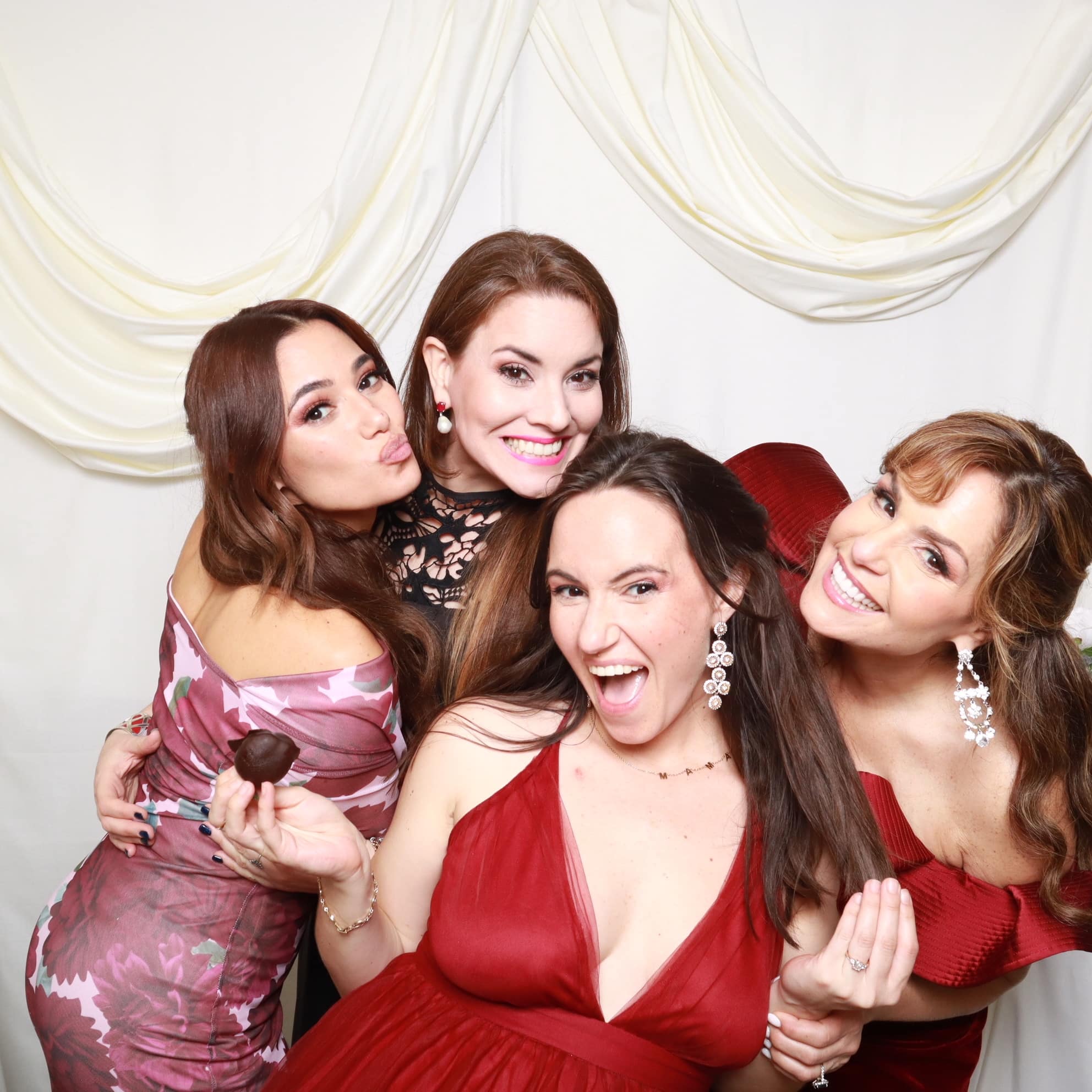 Lake Mary Events Center Wedding Photo Booth: Bridesmaids in black and pink dresses posing in wedding photo booth