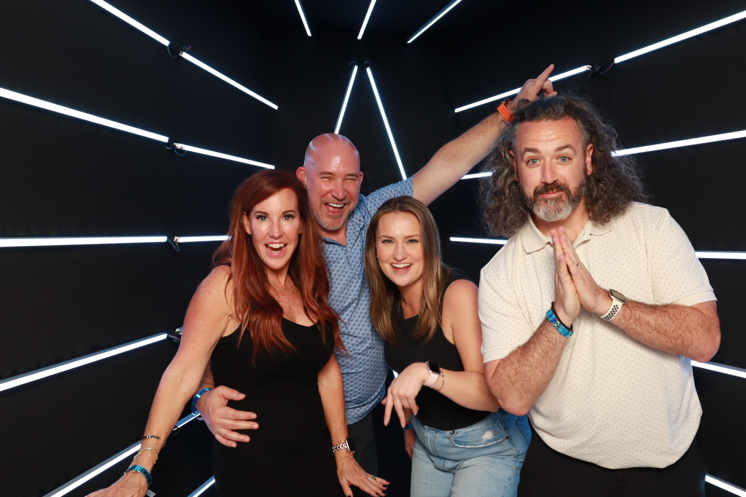 Guests posing inside Vogue Photo Booth at Daytona Ignite kickoff event