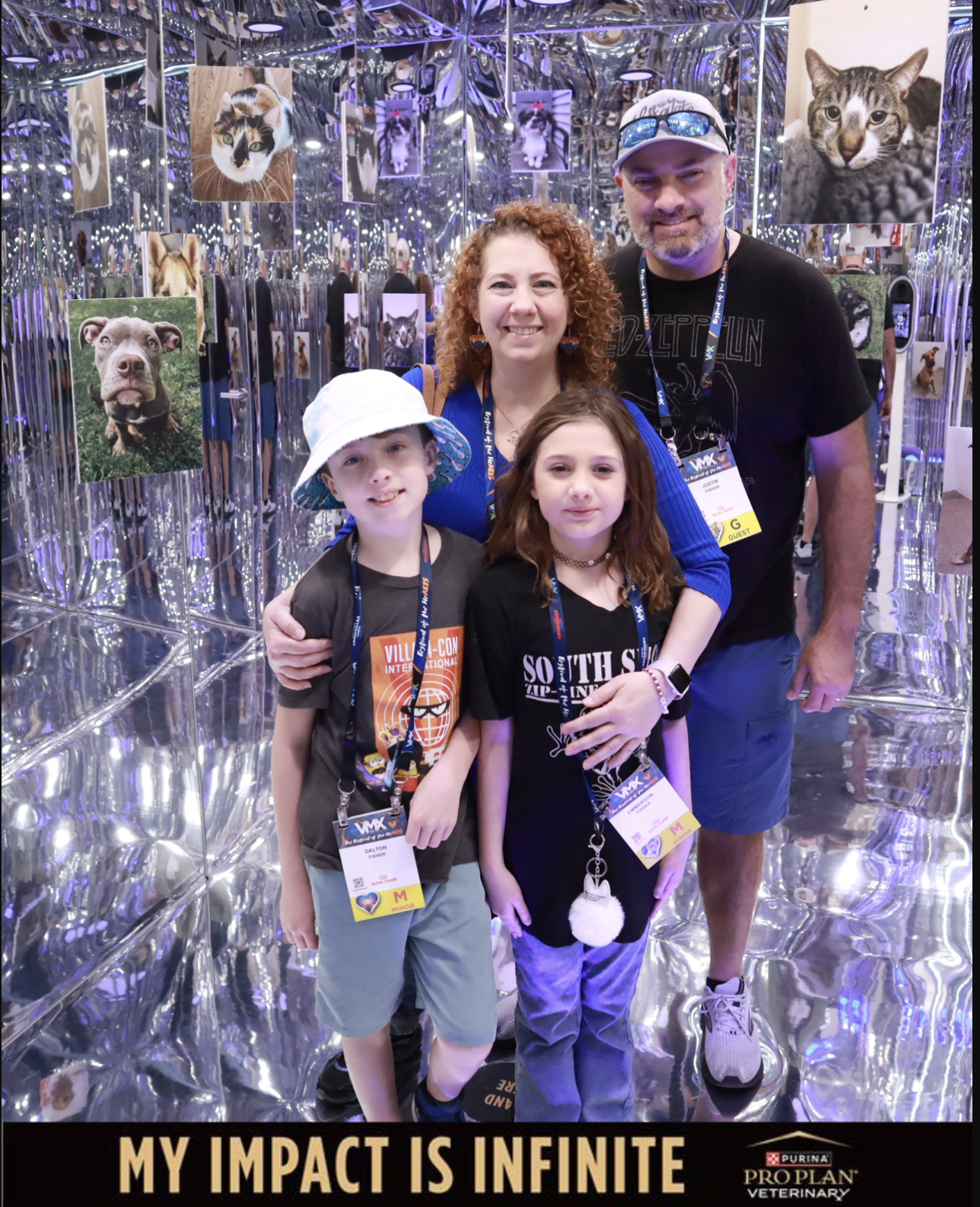 Attendees posing inside Purina Pro Plan Infinity Room Photo Booth at VMX 2025 with mirrored walls and hanging pet portraits