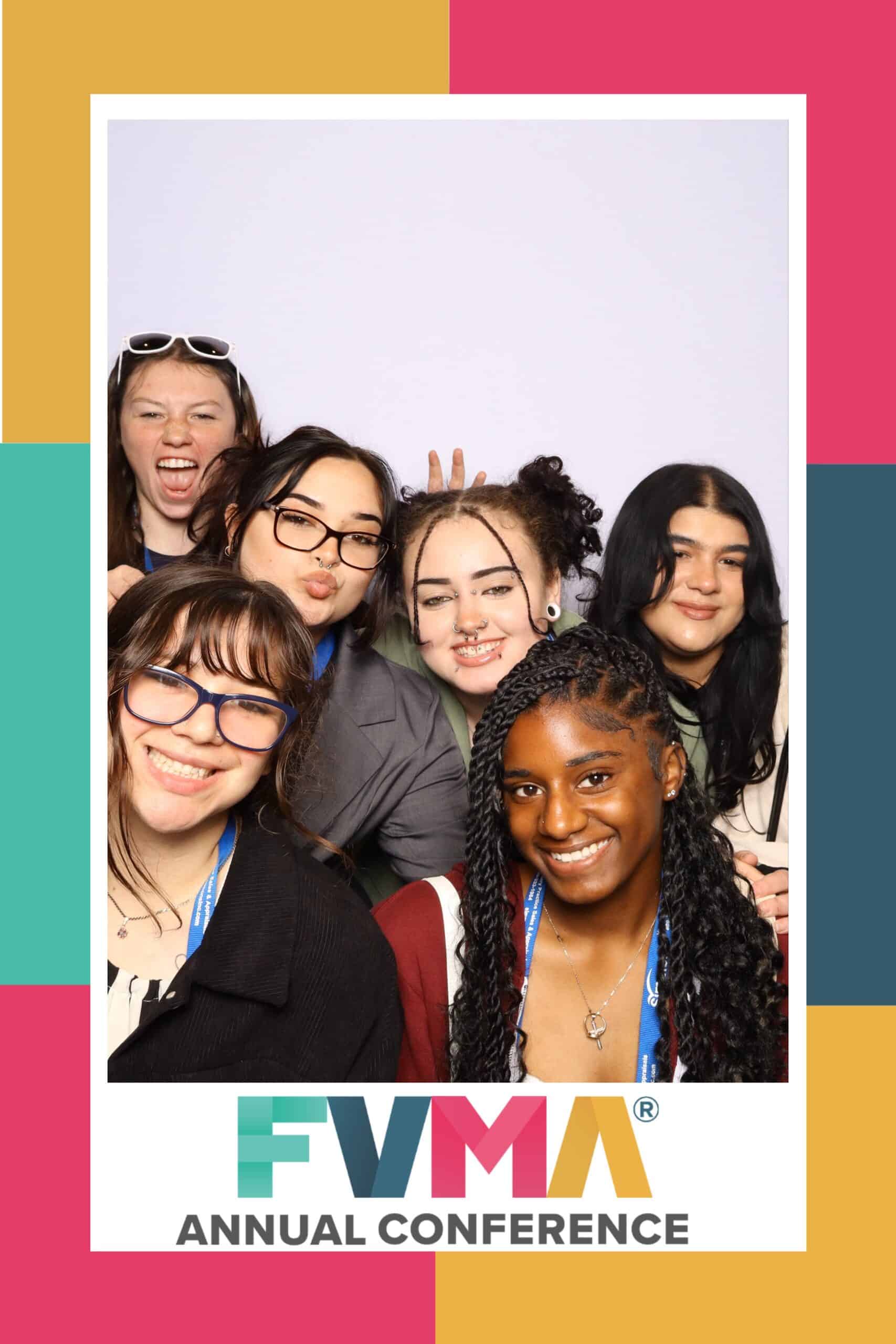 Attendees posing with Mosaic Photo Booth at FVMA Annual Conference in Orlando